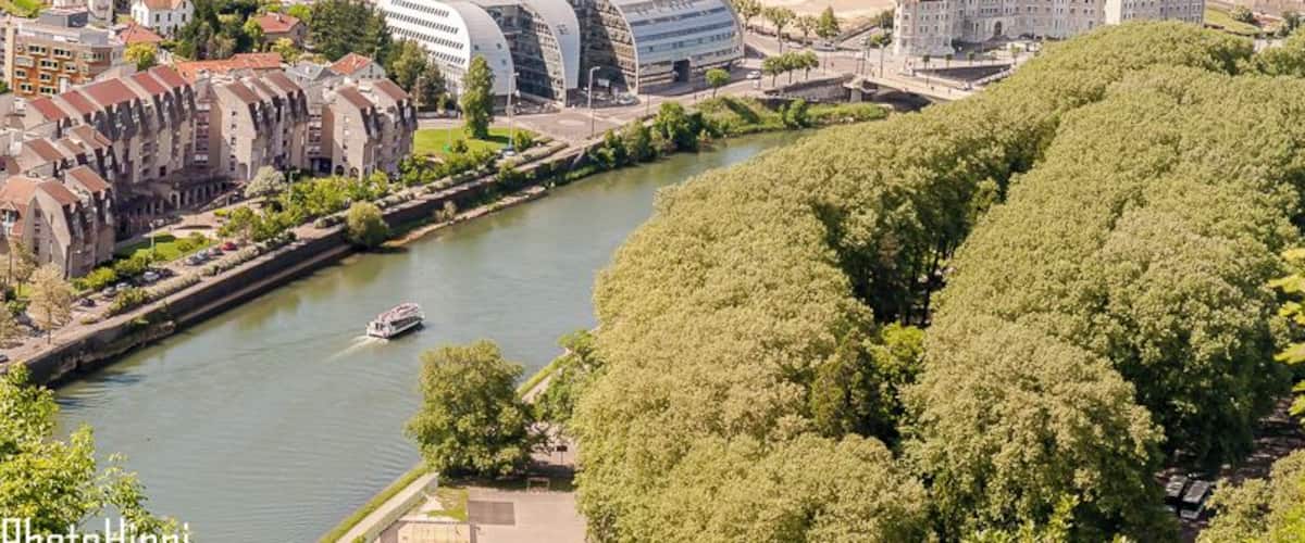 A view of the river Le Doubs from Fort de Bregille, with the edge of Park La Gare d'Eau on the right. #Besancon #travel #travelphotography