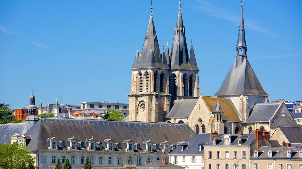 A historic cathedral with multiple spires and a large central tower.