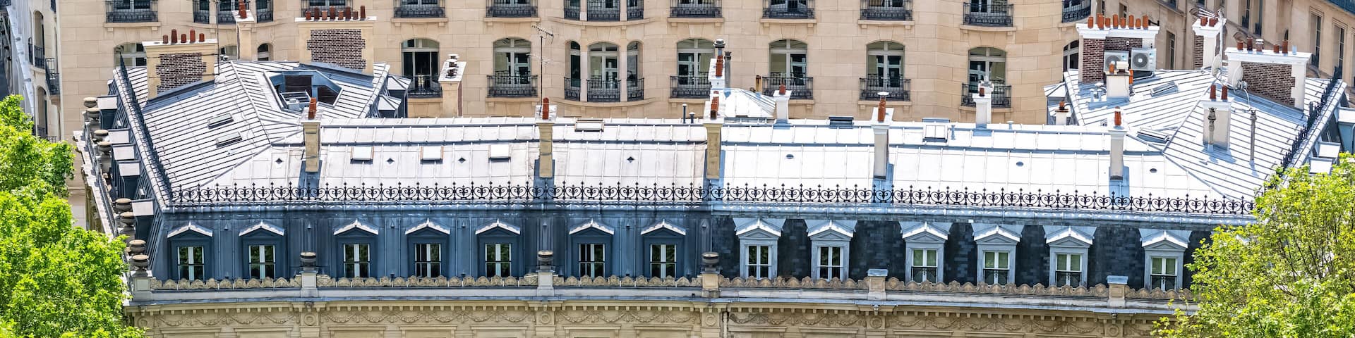 Paris, luxury Haussmann facades and roofs in a attractive area of the capital, view from the triumph arch