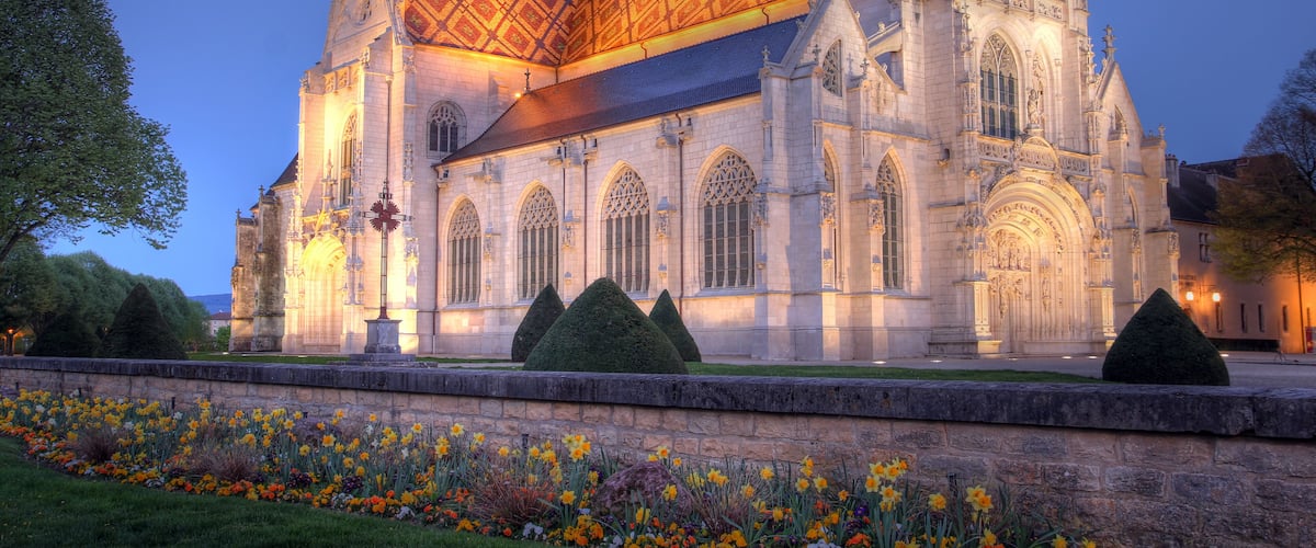 A Gothic-style cathedral with a large rose window and a pointed roof.