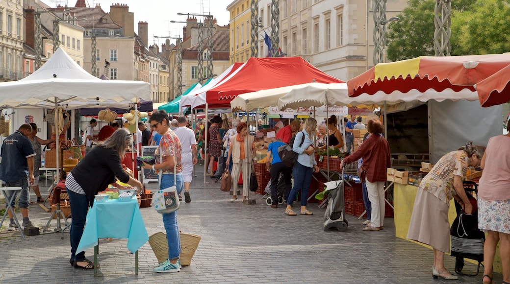 Chalon-sur-Saone showing markets and street scenes as well as a small group of people