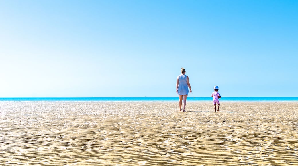 Mother and child at Camber Sands beach in summer, East Sussex, England