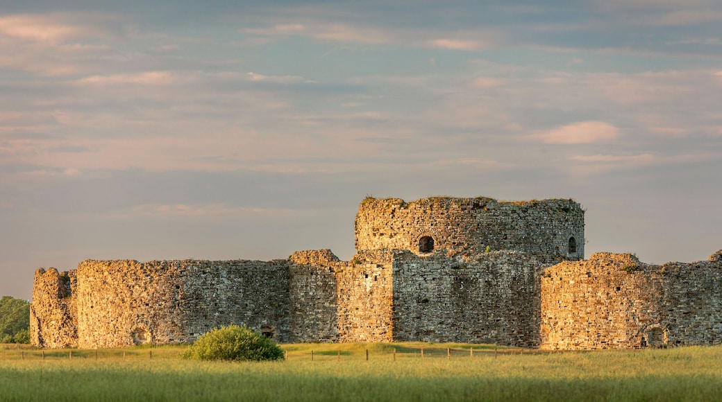 Camber Sands castle being bathed in the evening golden hour light near Rye East Sussex south east England UK