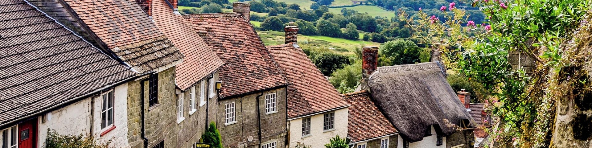 Gold Hill, Shaftesbury. Cobblestone street with quaint cottages.
#History