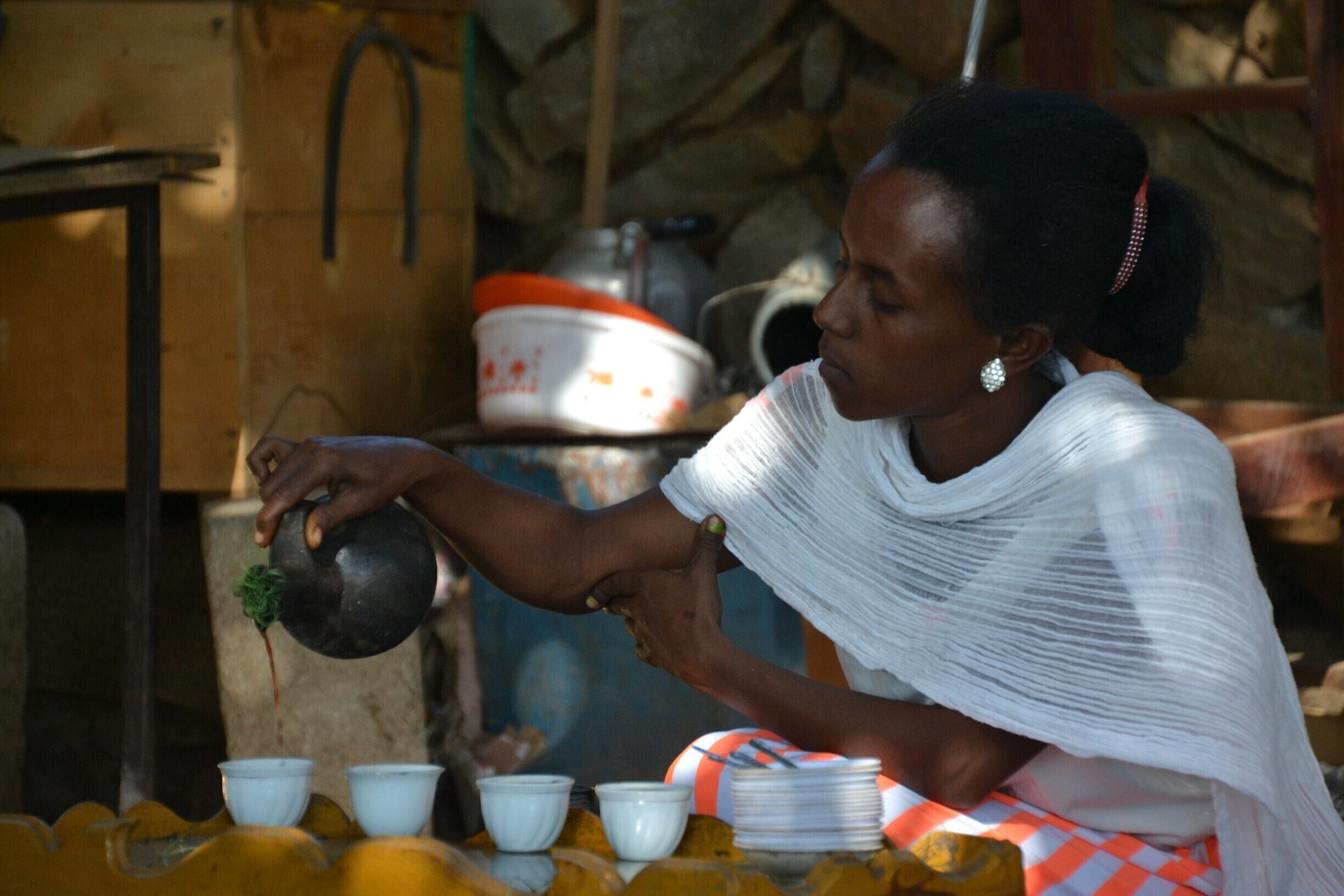 A traditional coffee ceremony in Ethiopia is a must do experience. It is a treat for both the eye, nose and mouth. The sight of a beautiful lady preparing your coffee while eating popcorn and smelling the coffee beans being roasted, and at the same time inhale the fumes of some natural burning incense...an experience not to be missed when in Ethiopia.

More stories from Ethiopia on my travel blog: http://www.earthseeing.com/destinations/africa/ethiopia/

#ethiopia #people #food