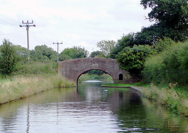 Birmingham and Fazeley Canal near Curdworth, Warwickshire Approaching Broad Balk Bridge. The bridge carries a farm track and public footpath.