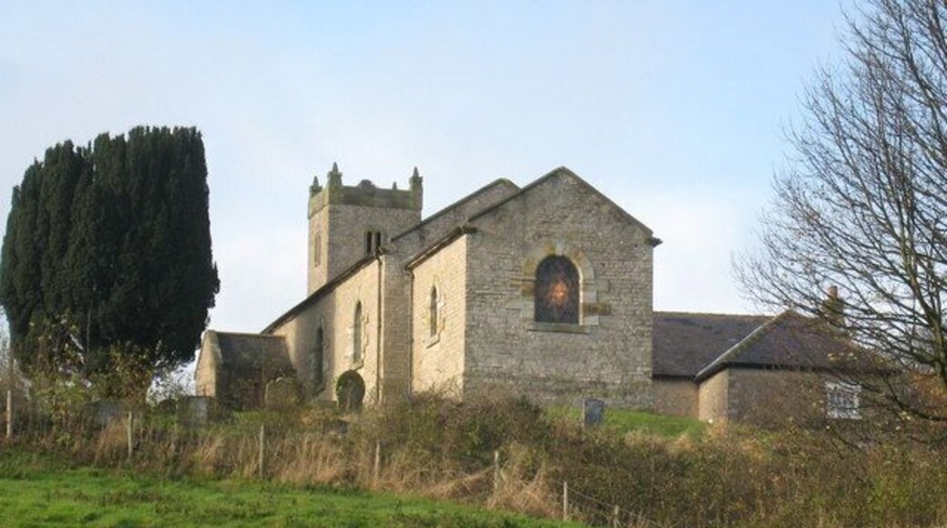 St Michael's Church in Cold Kirby The church in Cold Kirby is located towards the east-end of the village at SE 533 845. This photograph was taken from the back-end of the church from a position on the Cleveland Way long-distance footpath. The Cleveland Way passes around the eastern side of the church as it makes a connection with Low Field Lane. Notice the light showing in the window indicating that a service was probably taking place - the photograph was taken on a Sunday morning.