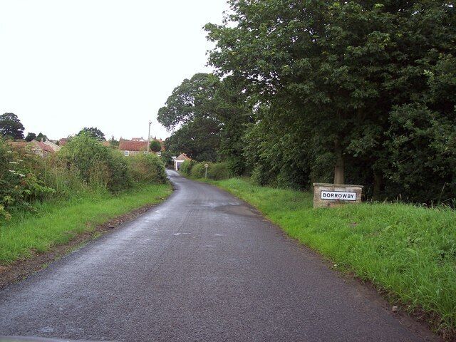 Lane into Borrowby Park Lane, which enters the village from the west.