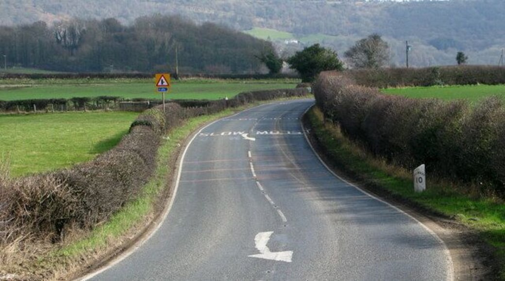 Sutton Under Whitestonecliffe Milepost Milepost located beside the A170 on the outskirts of the village. Sutton Bank is in the distance.