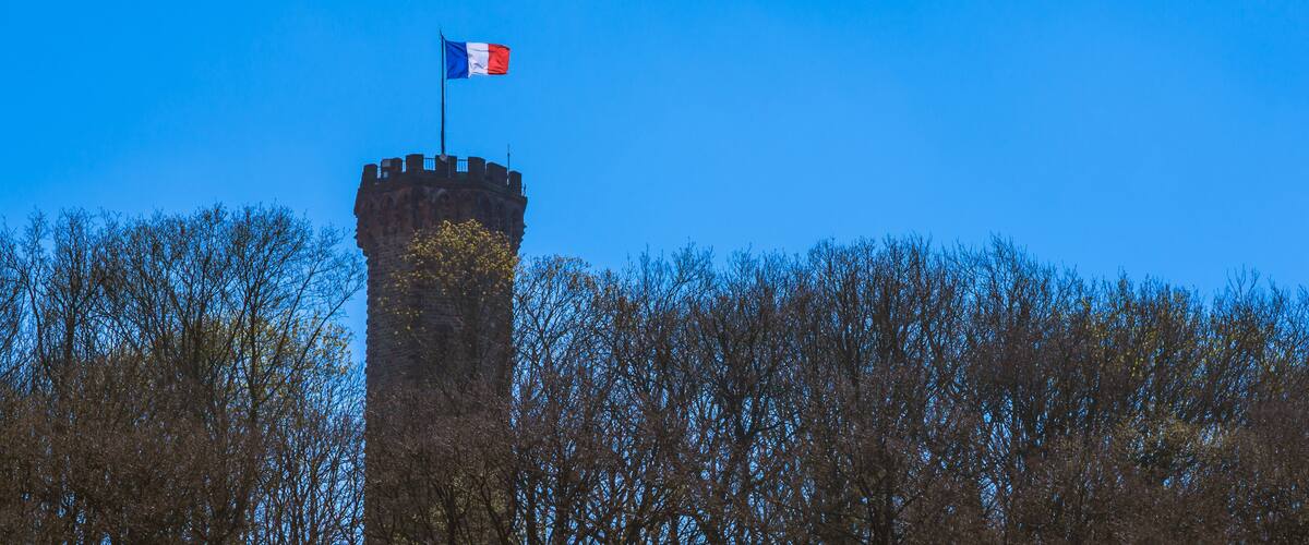 A tower with a French flag.