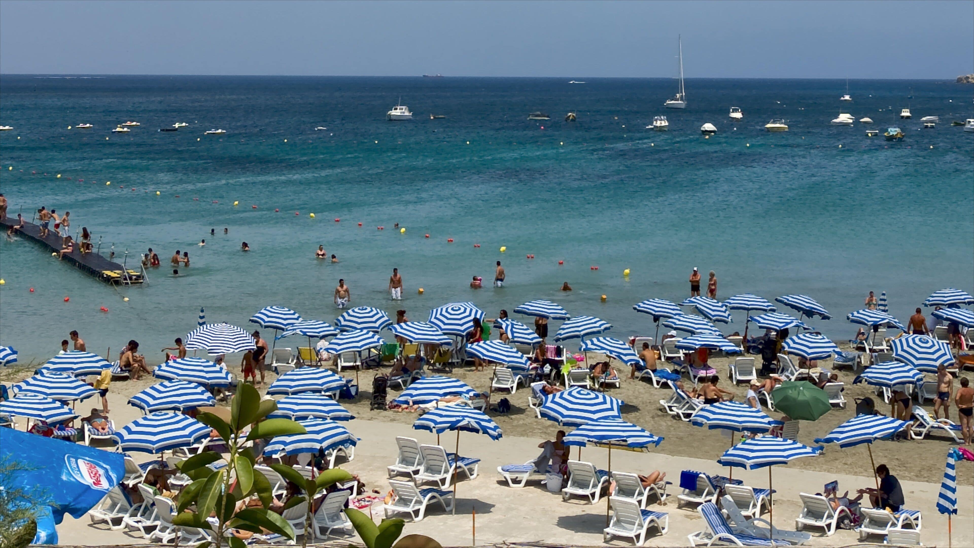 Mellieha showing swimming, general coastal views and a sandy beach