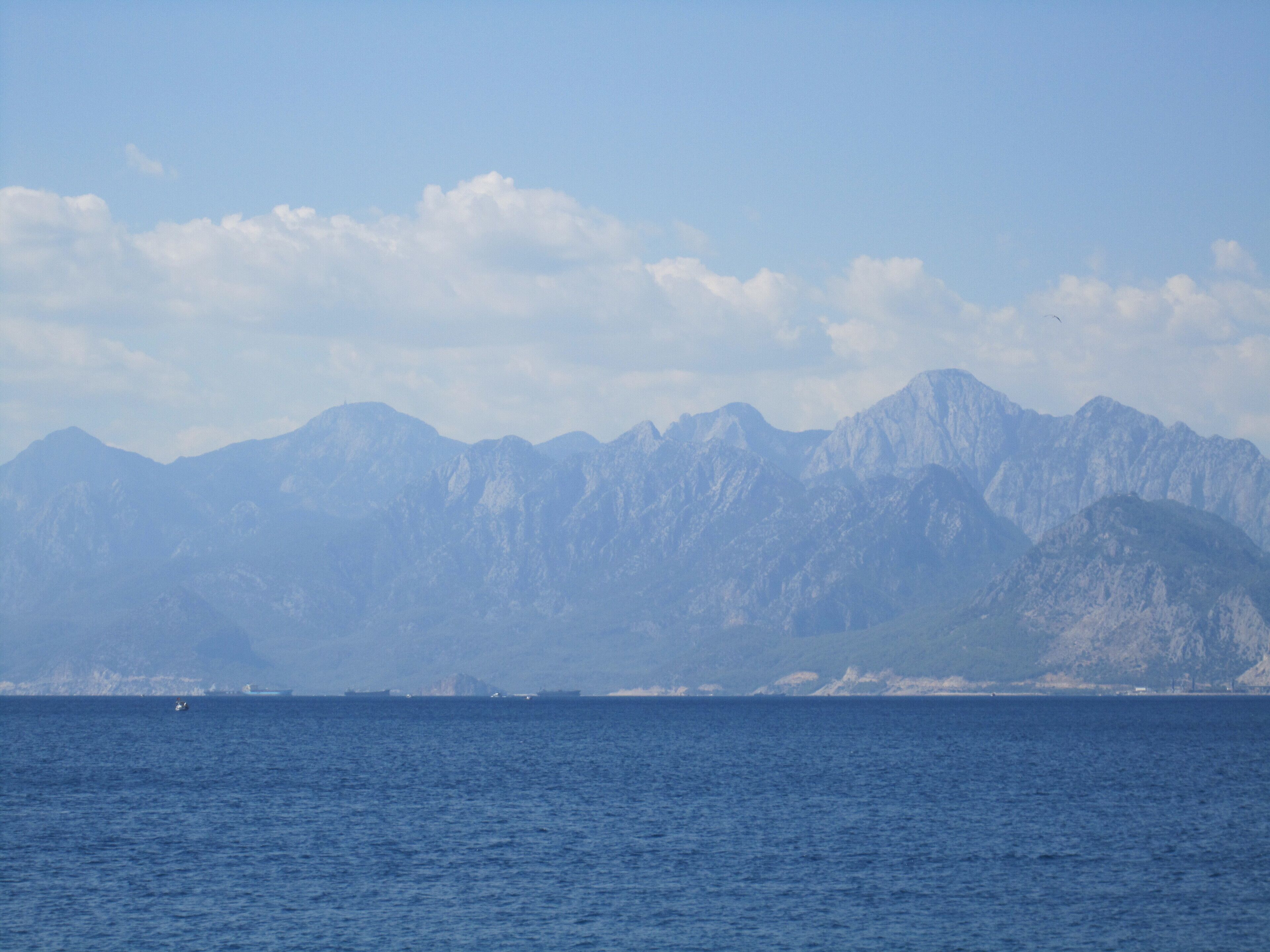 A haze of blue across the sky, the mountains, and the sea. Antalya is a seaside city in the south of Turkey, along the Mediterranean. So much to offer. Alanya and Kemer are close by and must sees. #turkey Antalya, Turkey Fall 2013