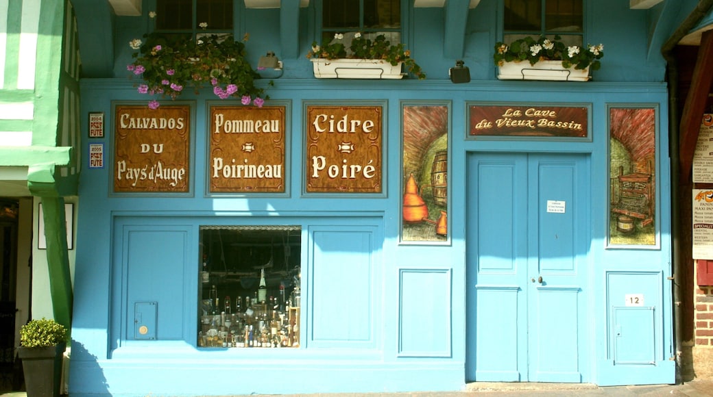 Honfleur which includes cafe lifestyle and signage
