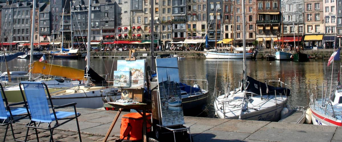 Honfleur featuring boating, a coastal town and a bay or harbour