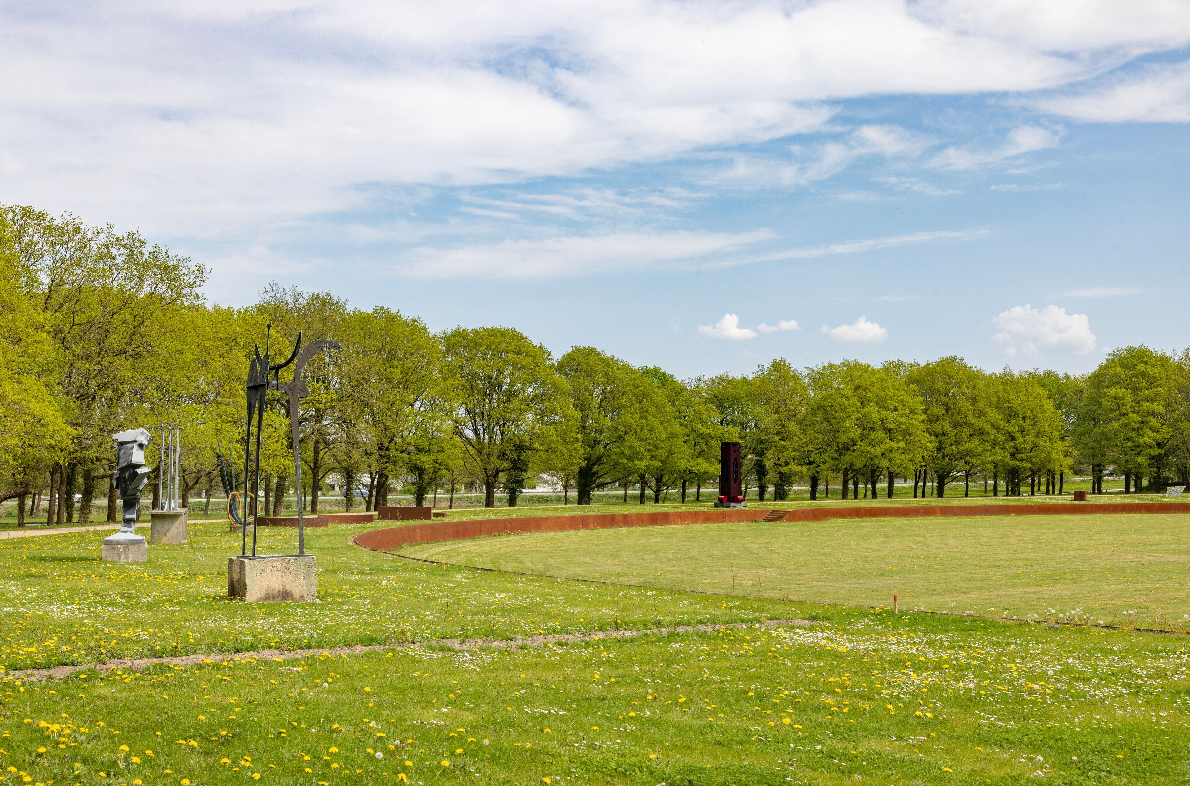 Walking through the Herning sculpture park and educational area