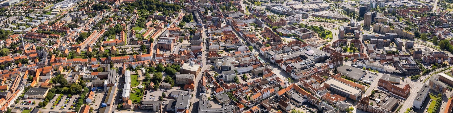 A panorama Aerial view around the old town in the city of Horsens in Denmark on a sunny summer noon