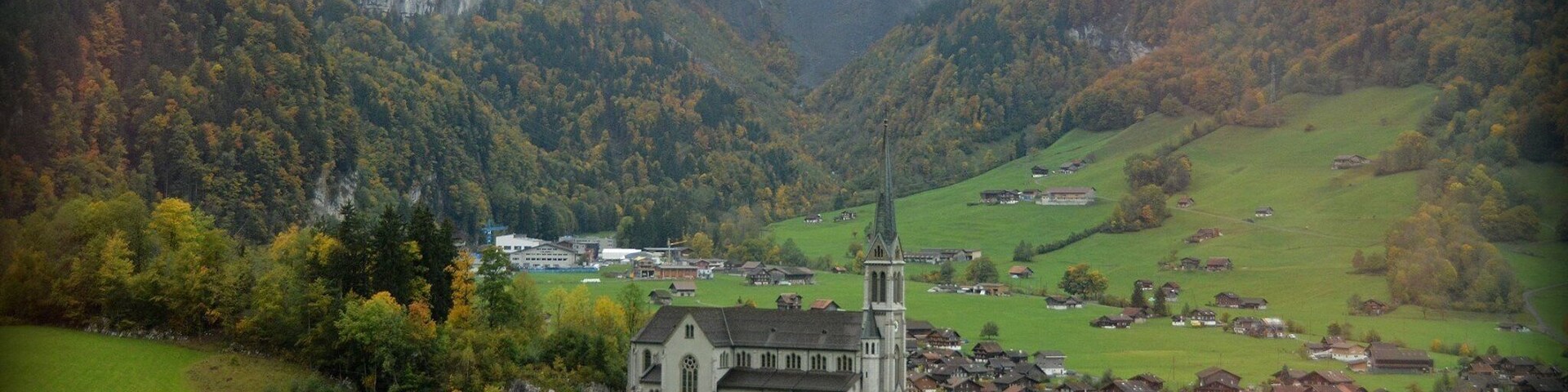 Take a train ride from Lucerne to Interlaken and then up to Lauterbrunnen and Murren for spectacular sights like this . Taken out the train window.
