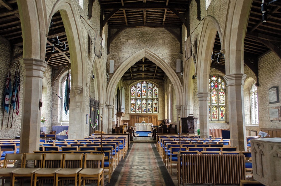 Grade II*listed The church dates from the 12th century onwards. There is a western tower with spire, nave with aisles and clerestory, chancel, vestry, and south porch. The tower dates from the late 13th century and is topped with a broach spire with lucarnes. It is 99 feet tall. A ring of six bells dates from 1598. The nave has three bays to the north and four to the south, and dates from the 14th century. The clerestory was added later, the line of the old roof being visible inside. The chancel is probably older but with perpendicular windows, the east window has stained-glass from circa 1890. The south porch was built in 1851 and originally had a priest's room over. The south door is Norman with zigzag patterning. There is a font with a base from circa 1200 and a later octagonal bowl. Originally there was a gallery and organ at the west end of the nave, but these were removed in 1866. The east part of the north aisle has been sectioned off as an RAF Memorial Chapel. It was dedicated in 1949. There are plans to create a meeting room in the north-west corner of the church.