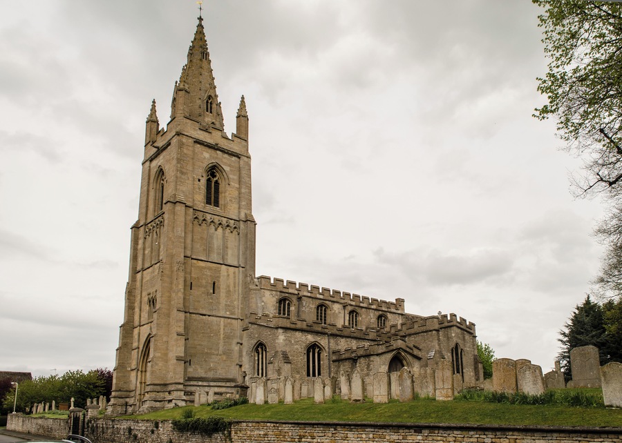 Grade I listed. The church dates from the 13th century onwards and consists of a fine 14th century tower of four stages with a spire, nave with aisles, transepts, chancel, north vestry and south porch. The nave has a late 13th century four bay north arcade, and an early 13th century four bay south arcade. The clerestory is perpendicular. The chancel, with fine sedilia and double piscina, dates from the 13th century, contemporary with the south transept. The north transept is slightly later, and contains a 13th century wall tomb. The south porch is from the 14th century. The font is in the 14th century style, and dates from 1895. There is also a late 17th-century oak pulpit. The church was restored in 1895.