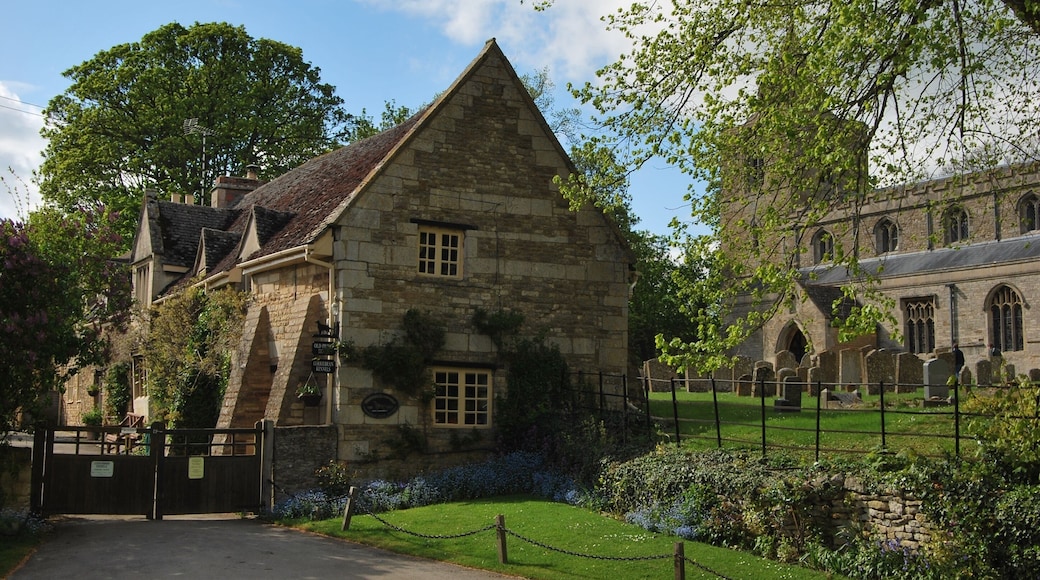 Hambleton, Rutland: the Old Priest's House (left) and Church of England parish church of St Andrew (right).