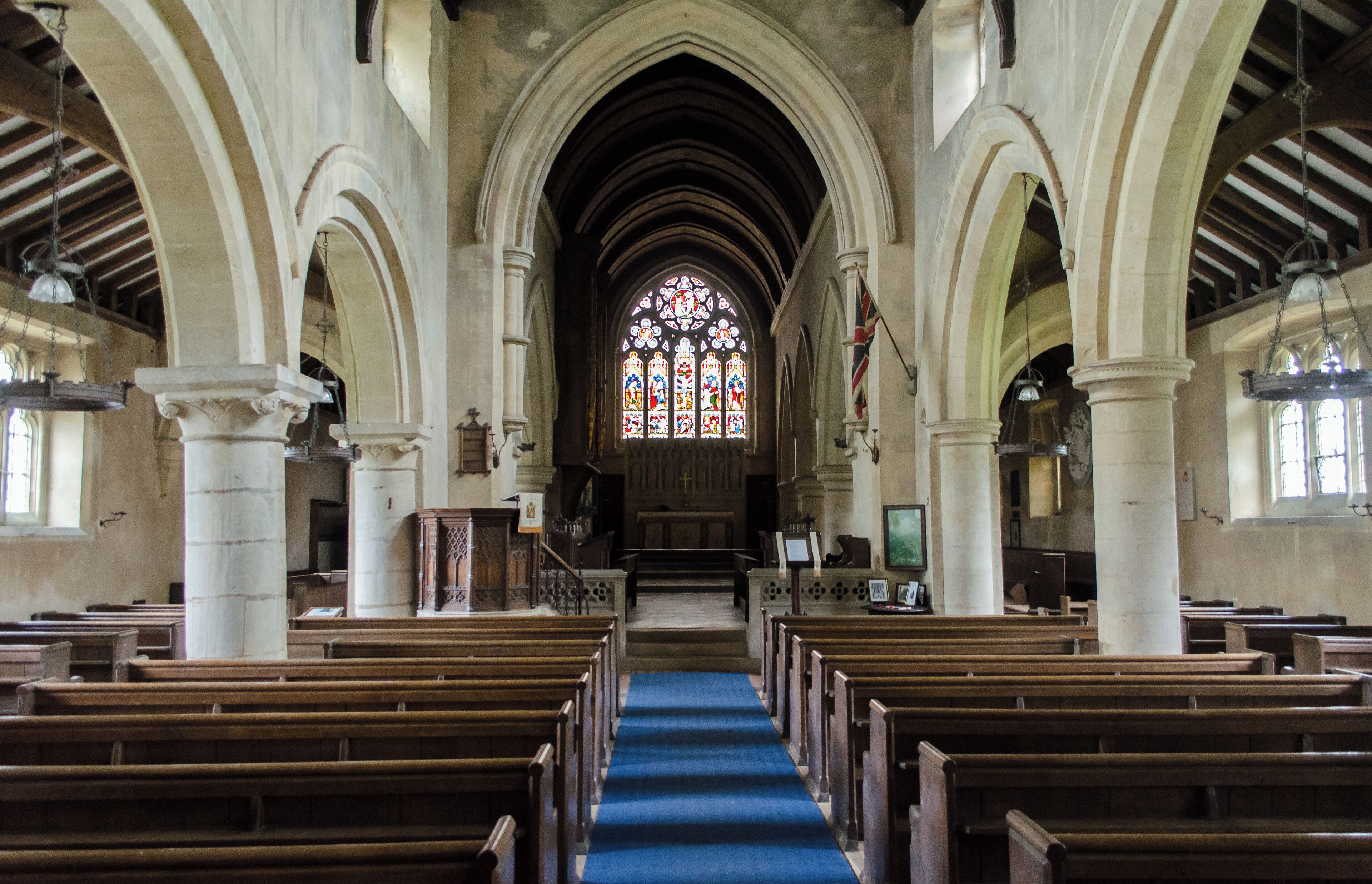 Grade II*listed The church is adjacent to Burley on the Hill House which was built in the 1690s by the 2nd Earl of Nottingham. The church dates from the 12th century onwards consisting of a west tower, nave with aisles, clerestory, and 3 bay aisled chancel. Originally the church consisted of a nave, chancel and north aisle, the south aisle was added later. The tower is from the early 14th century with embattled parapet and gargoyles. The north arcade has three bays and is Norman with round arches, the south arcade is late 13th century with circular piers and pointed arches. There is a late 15th C. mutilated effigy of a Knight and his wife. The font is 15th C. octagonal with eight different tracery designs. The church was restored in the late 18th-century when box pews were added. The church was rebuilt in 1869/70 by Pearson, who rebuilt the aisles, clerestory windows and chancel. The church was declared redundant in May 1984 and is now managed by the Churches Conservation Trust.