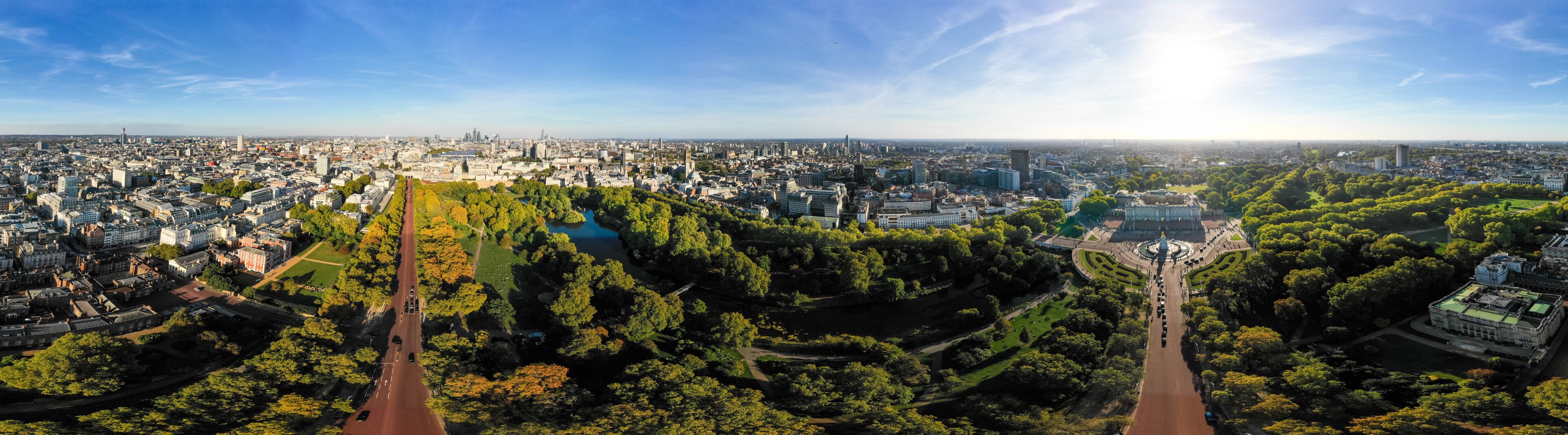 Aerial London City Skyline Wide 360 Degree Panorama View in Central London around Buckingham Palace feat. St James's Park and The Mall in Westminster, England, United Kingdom
