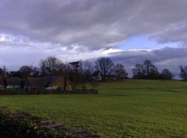 Showground, Winslow Field opposite Winslow Hall where the Winslow Show has been held for many years. The black and white house in the distance is Shipton Farm.