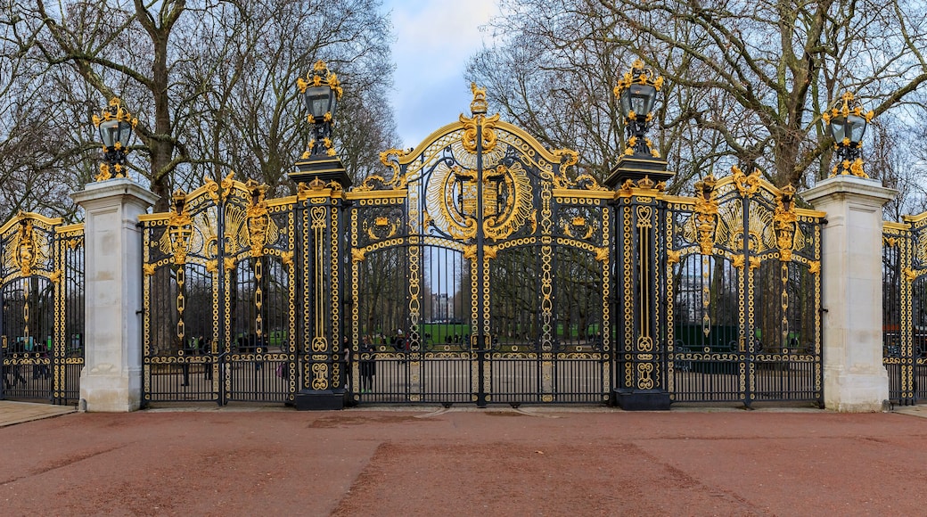Ornate wrought iron and gold Canada Gate of the Green Park in front of the Buckingham Palace in London UK