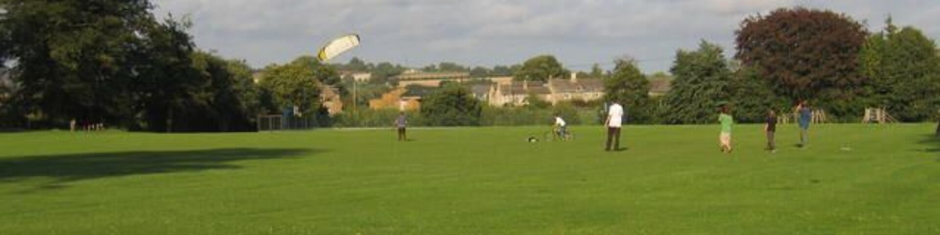 Kite flying, Milton under Wychwood. Local activities on the village playing fields on a windy day.