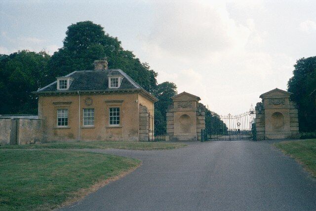North Lodge of Cornbury Park. Cornbury Park is a private estate near Charlbury, originally a hunting lodge in the royal forest of Wychwood. It now hosts events such as the Cornbury Festival, featuring middle-of-the-road music, sponsored in 2005 by Waitrose and nicknamed 'Poshstock' by one newspaper. According to Pevsner, this lodge at the north gate (and a twin to the right of the gate) dates from the start of the 20th century, and are by John Belcher.