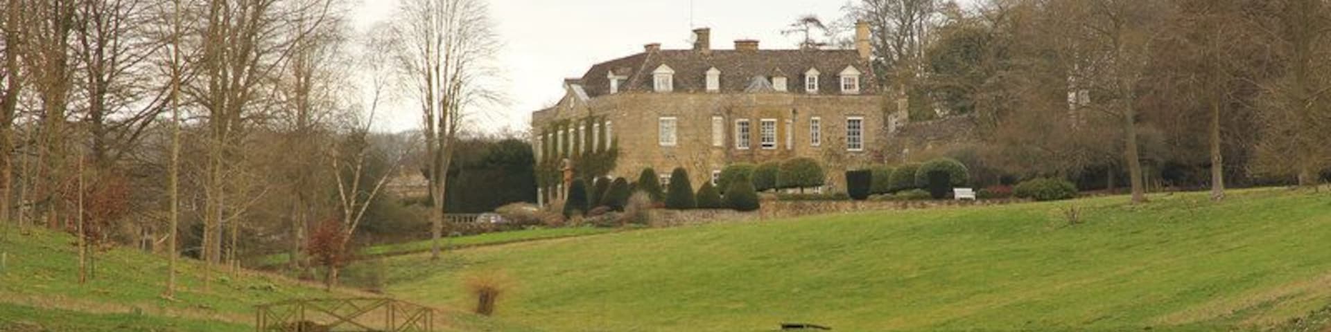 Cornwell Manor. Grade II* listed Manor House of c1750 incorporating an earlier 16th & 17th century house. The house, house interiors and grounds of Cornwell Manor doubled as the "Cuba Hotel" in the Father Brown tv episodes "The Lair of the Libertines" and "The Wrath of Baron Samdi" (2016). This particular view can also be seen in the Father Brown episode "The Alchemist's Secret" (2017).