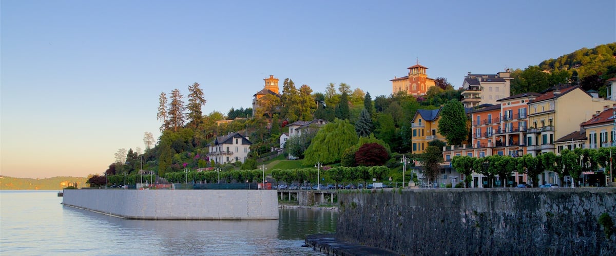 Stresa featuring a small town or village, a sunset and a river or creek