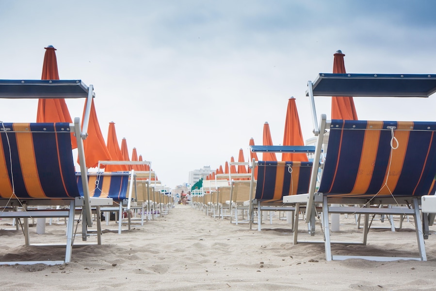 Umbrellas and sunbeds in Rimini and Riccione and Cattolica Beach, Italy