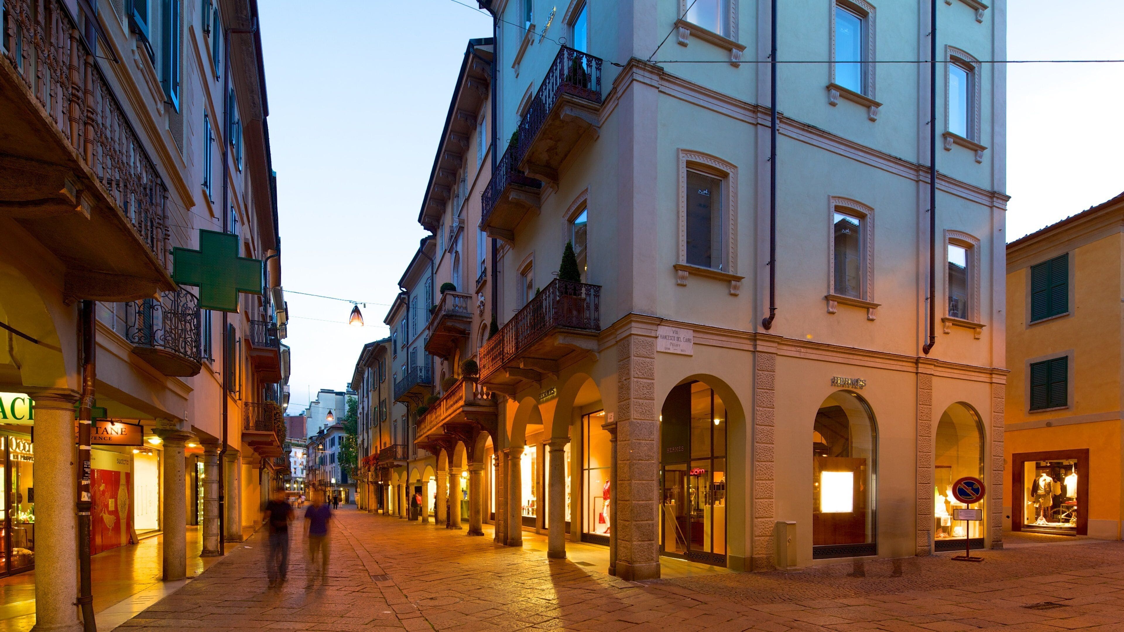 Varese featuring night scenes and street scenes