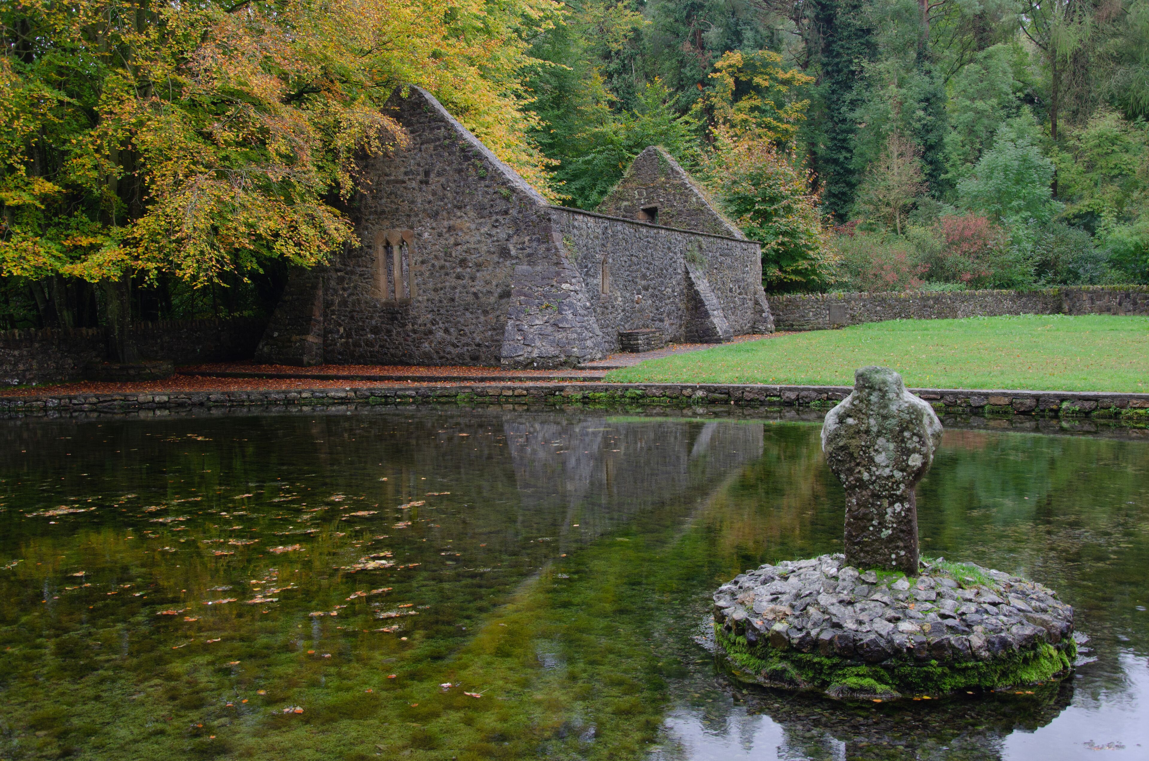 Clonmel, County Tipperary, Ireland - Saint Patrick's Holy Well with Celtic Cross near Clonmel Co. Tipperary Ireland