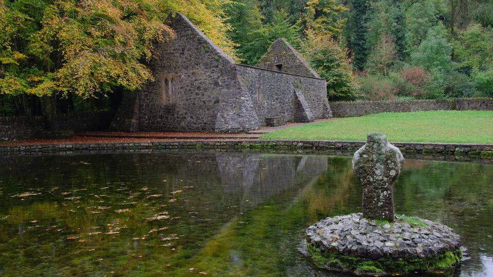 Clonmel, County Tipperary, Ireland - Saint Patrick's Holy Well with Celtic Cross near Clonmel Co. Tipperary Ireland