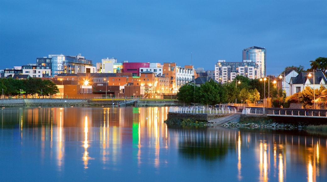 Limerick showing a river or creek, a city and night scenes