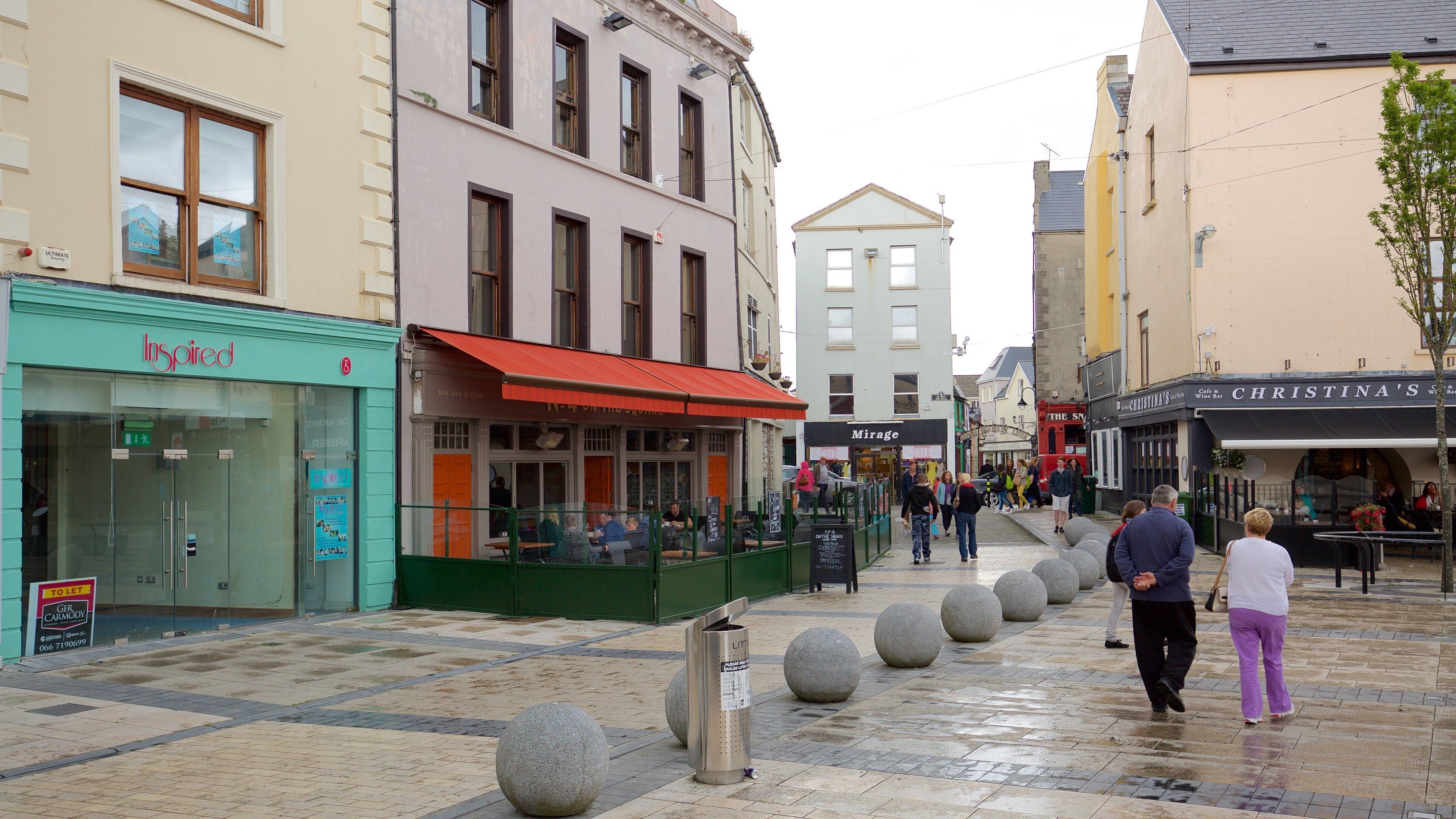 Tralee which includes street scenes as well as a small group of people