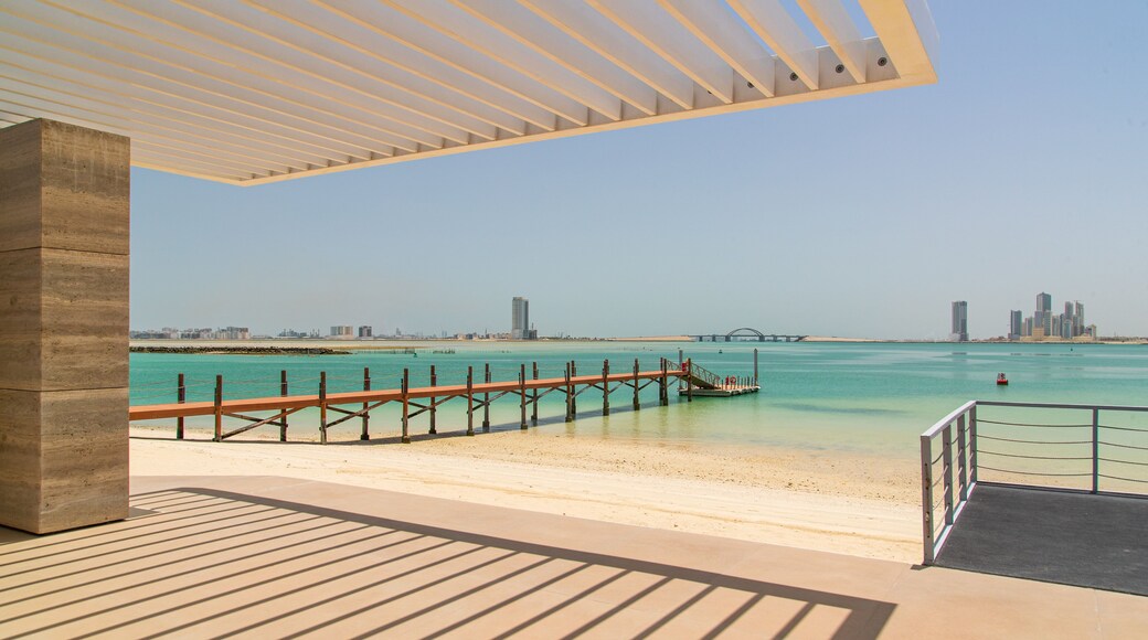Manama showing tropical scenes, general coastal views and a beach