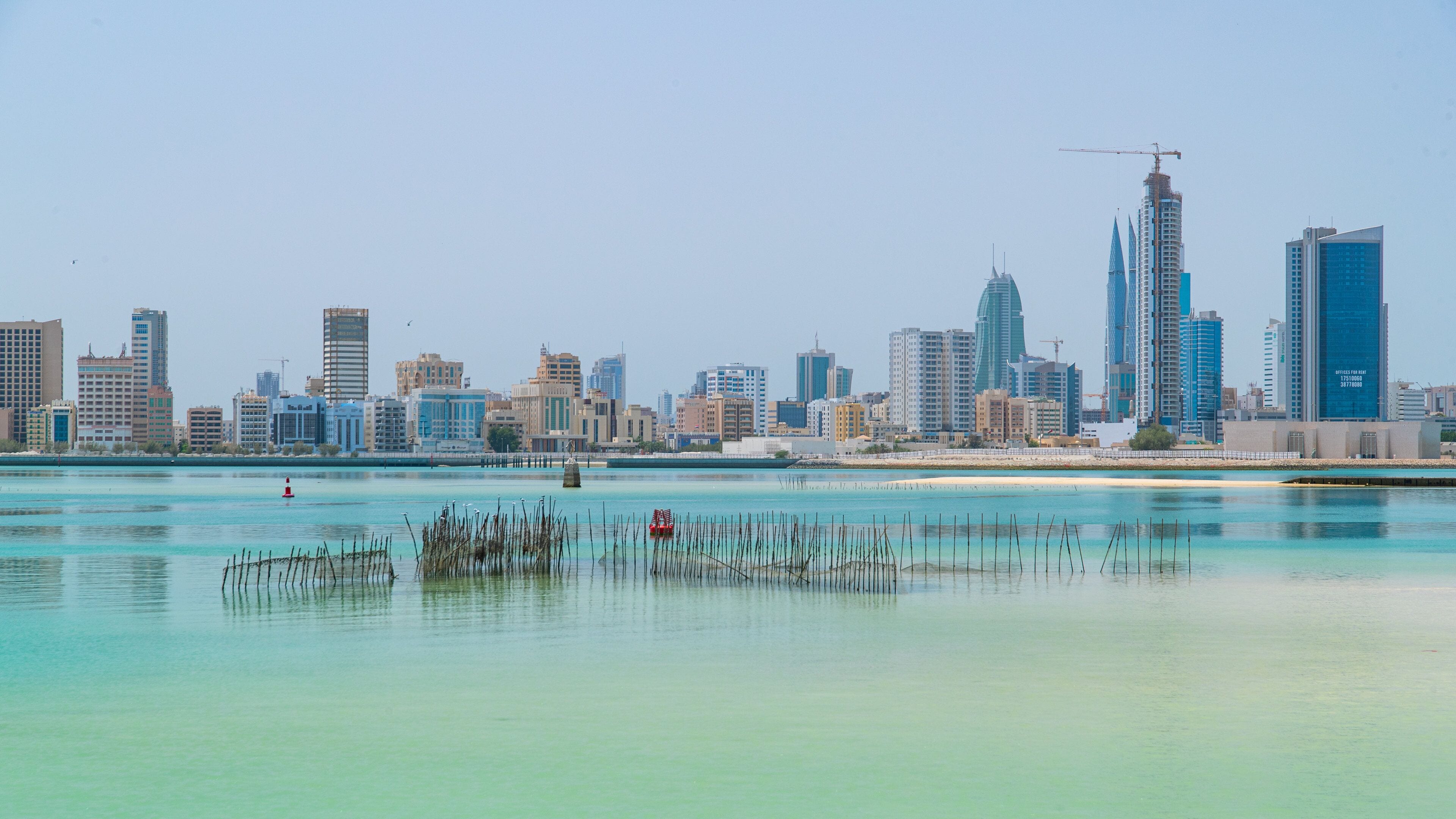 Manama which includes a city and a bay or harbor