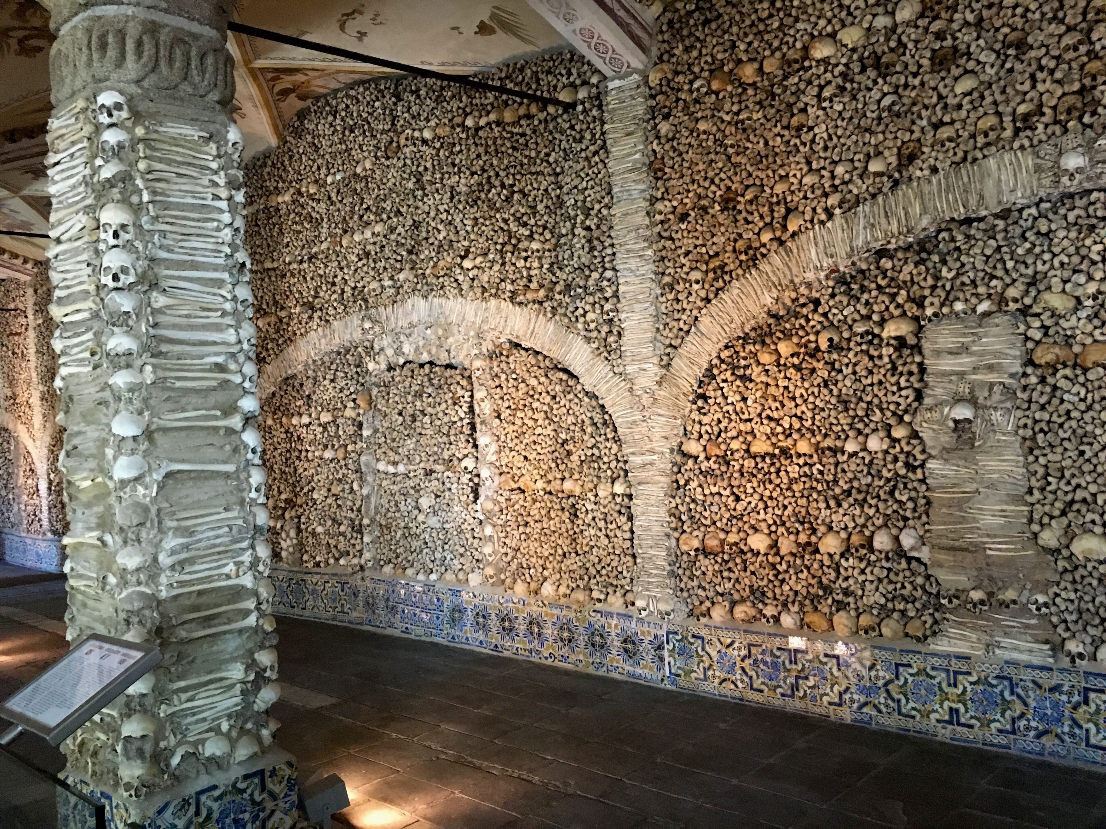 The Capela dos Ossos is one of the best known monuments in Ćvora, Portugal. It is a small interior chapel located next to the entrance of the Church of St. Francis.