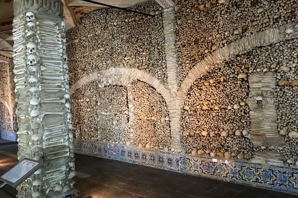 The Capela dos Ossos is one of the best known monuments in Évora, Portugal. It is a small interior chapel located next to the entrance of the Church of St. Francis.