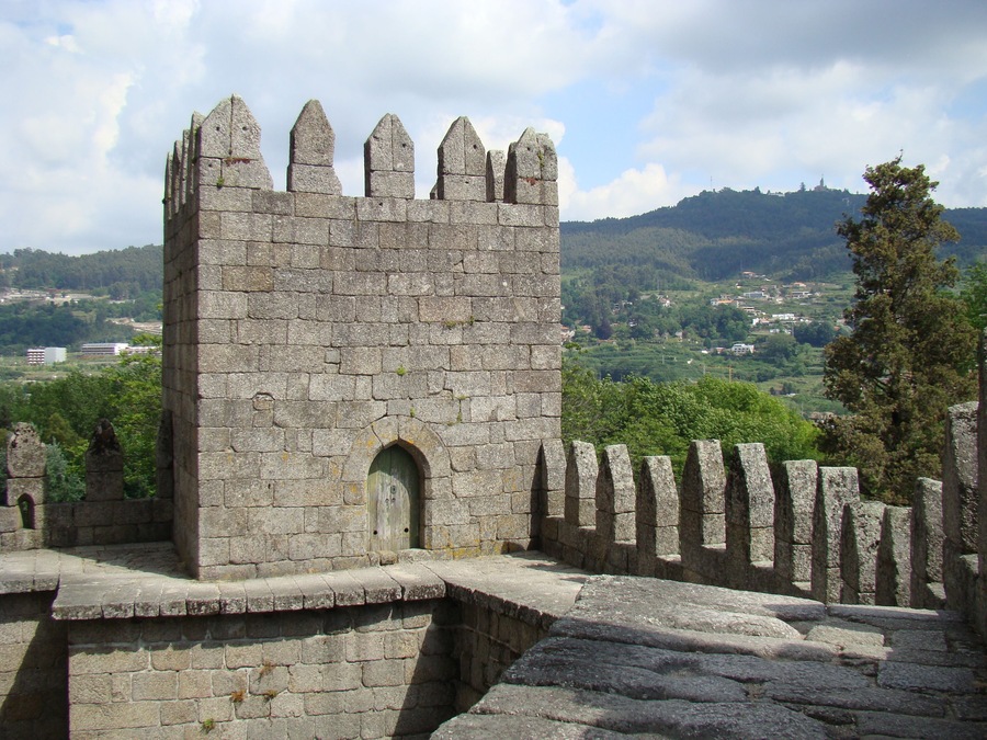 #Castelo #castle #Guimaraes #Portugal #History
O Castelo de Guimarães começou por um mosteiro mandado construir por Mumadona Dias no século X, antes, portanto, da formação de Portugal. Como os ataques dos mouros eram frequentes decidiram construir uma muralha para proteger a comunidade e os monges que viviam no seu interior. Foi esta fortaleza que deu origem ao Castelo de Guimarães. Mais tarde, no século XII, foi neste castelo que nasceu Dom Afonso Henriques que viria a ser o primeiro rei de Portugal. Com a falta de uso o castelo foi-se degradando. Recentemente foi recuperado e classificado como Monumento Nacional. É também considerado Patrimônio Mundial pela UNESCO. Um lugar cheio de história e que foi berço de Portugal. Não é à toa que em um pedaço da muralha original tem os dizeres “Aqui nasceu Portugal”.
The Castle of Guimarães began with a monastery built by Mumadona Dias in the 10th century, before, therefore, the formation of Portugal. As the attacks of the Moors were frequent they decided to build a wall to protect the community and the monks that lived inside. It was this fort that gave origin to the Castle of Guimarães. Later, in the twelfth century, it was in this castle that Dom Afonso Henriques was born. Some years after he would become the first king of Portugal. With the lack of use the castle was degrading. Recently it was recovered and classified as National Monument. It is also considered World Heritage by UNESCO. A place full of history and that was cradle of Portugal. It is no wonder that in a piece of the original wall has the words "Here was born Portugal".