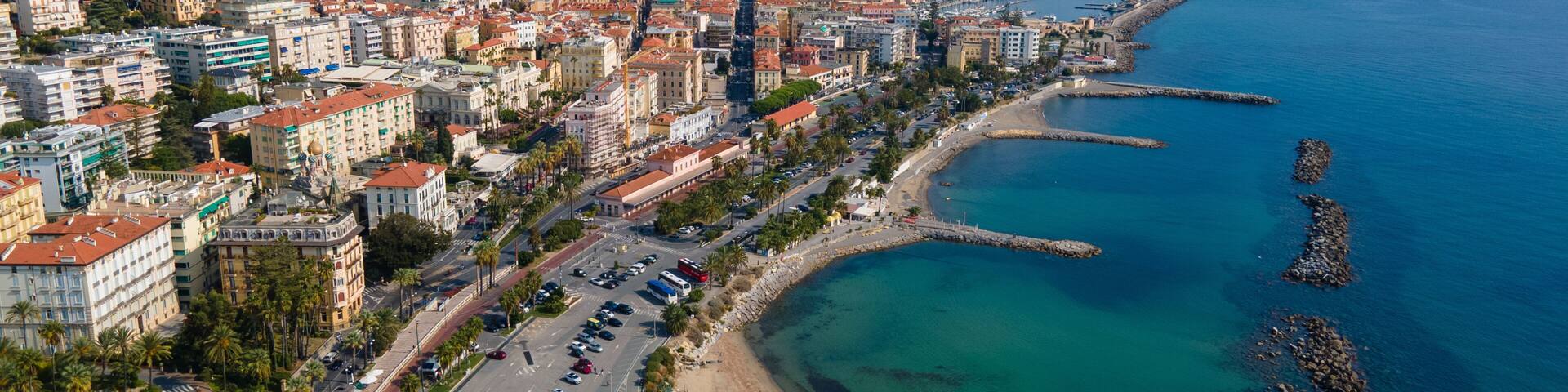 Sanremo aerial view at sunny day, beautiful Italian Riviera coastline with beach, turquoise sea and city architecture in Liguria, Italy