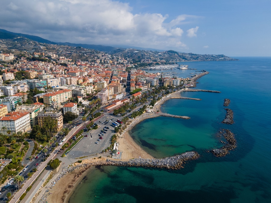 Sanremo aerial view at sunny day, beautiful Italian Riviera coastline with beach, turquoise sea and city architecture in Liguria, Italy