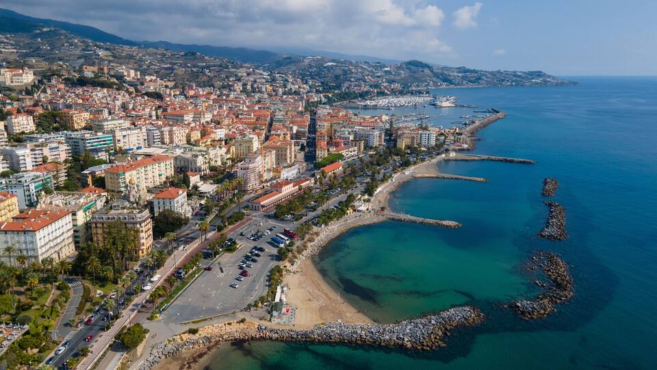 Sanremo aerial view at sunny day, beautiful Italian Riviera coastline with beach, turquoise sea and city architecture in Liguria, Italy