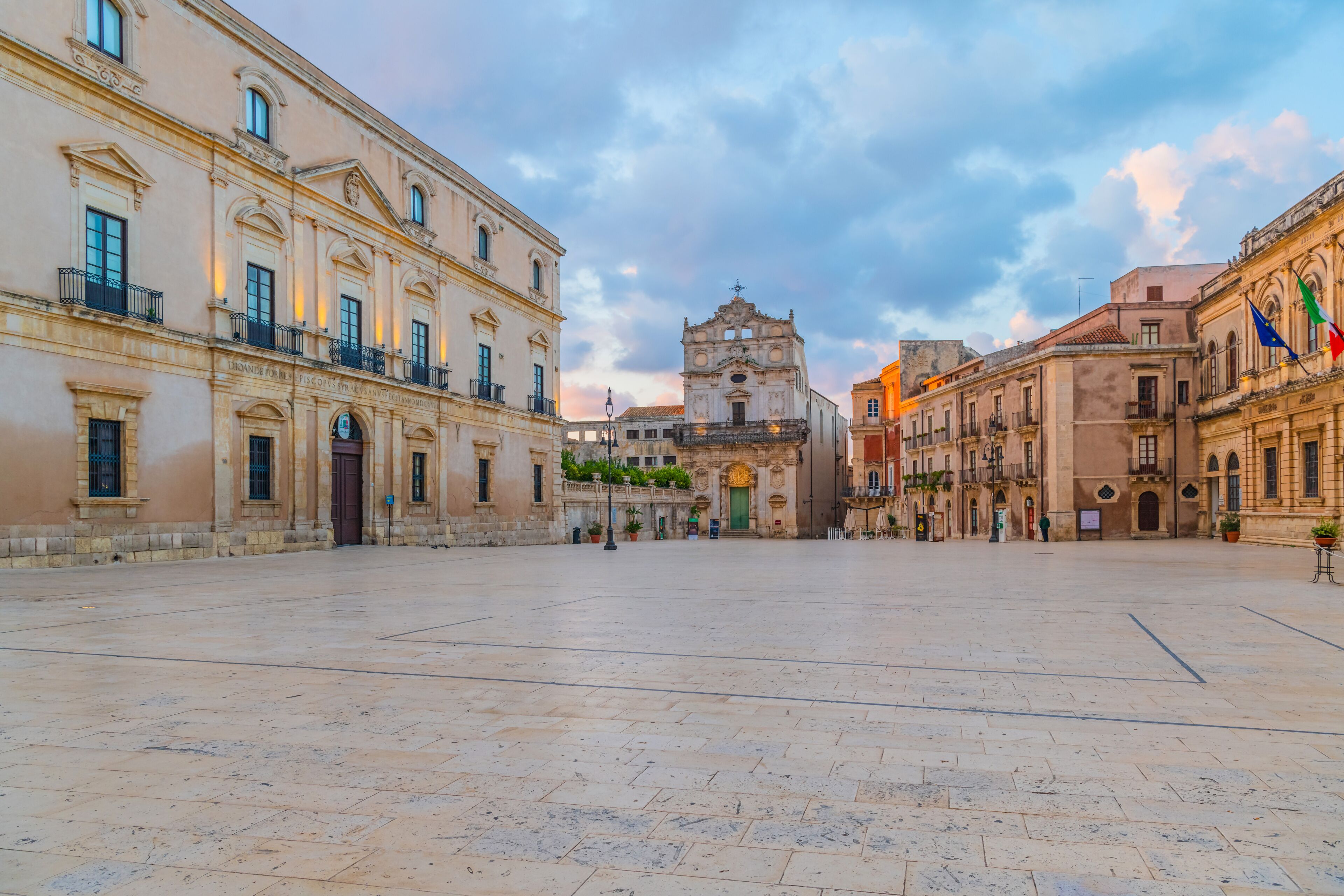 Ortigia square in Syracuse at sunrise, Sicily, Italy