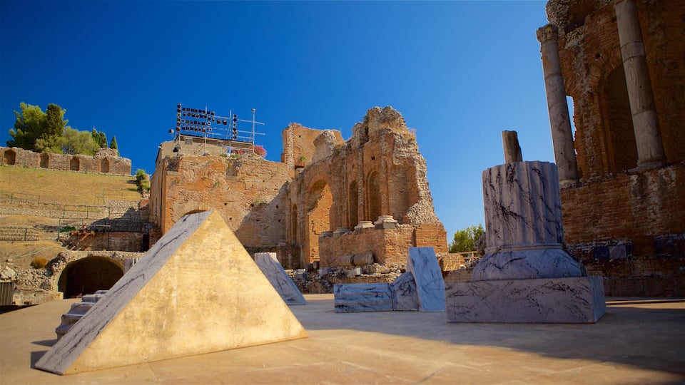 Ancient ruins with stone structures and columns.