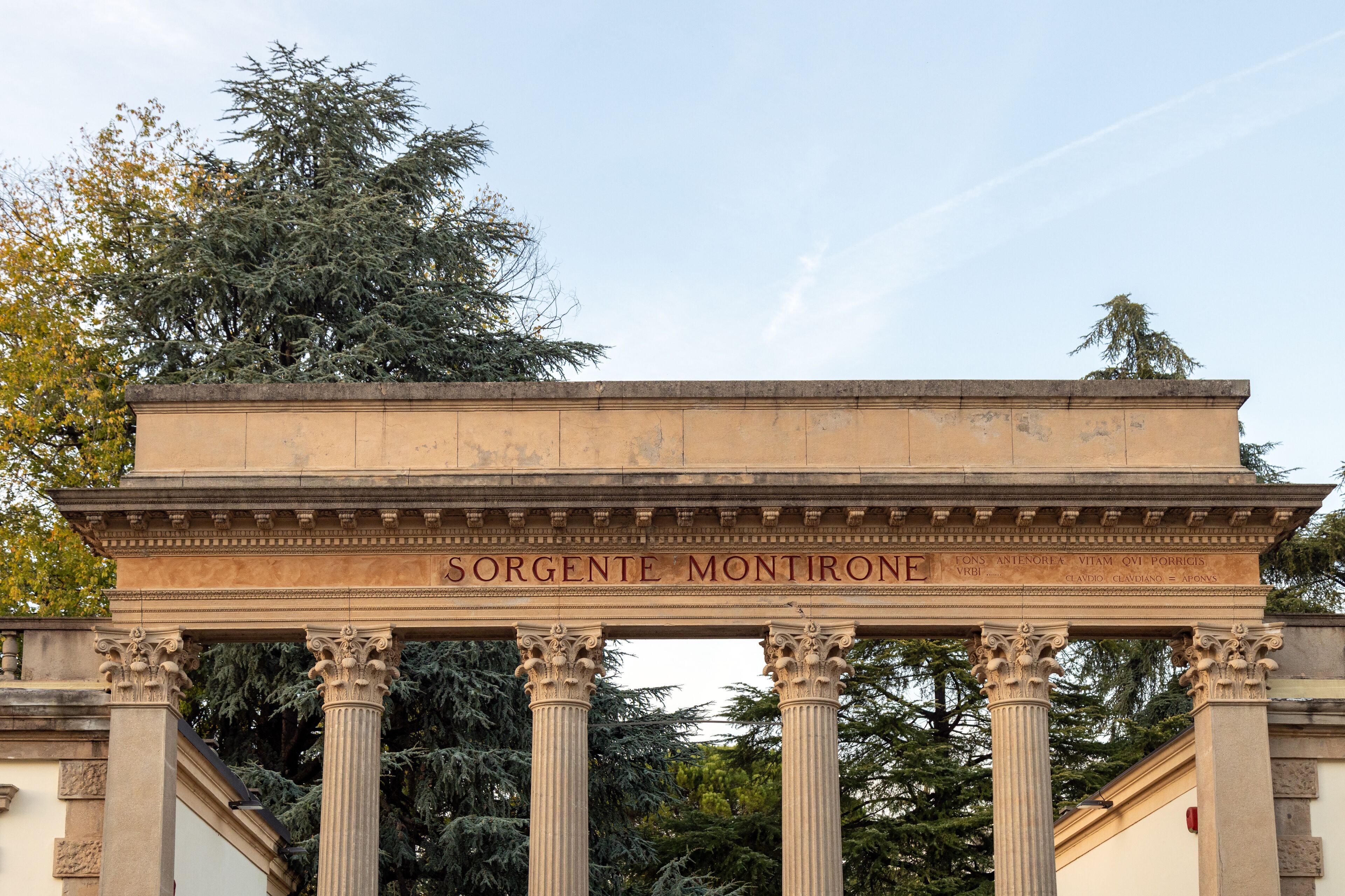 Close-up of the Sorgente Montirone neoclassical gateway at Parco Montirone in Abano Terme, Italy