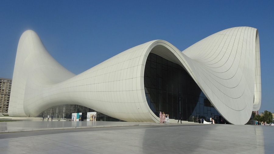 The Heydar Aliyev Centre was built in 2012 under the guidance of the legendary Iraqi-British architect Zaha Hadid (1950-2016). The building is famous for its smooth forms without sharp corners. #Azerbaijan #Architecture #ReDiscover #Trovember